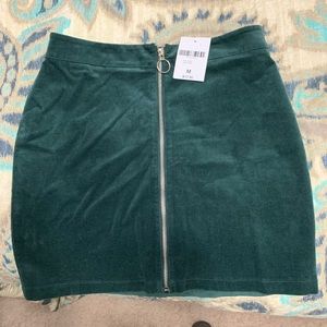 Dark green corduroy skirt. Size M.